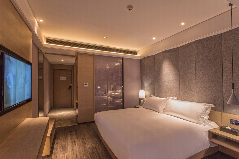 Habitación superior, 1 cama de matrimonio grande del hotel Mercure Suzhou Downtown. Foto 2