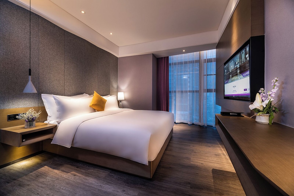 Habitación Deluxe, 1 cama de matrimonio grande del hotel Mercure Suzhou Downtown. Foto 1