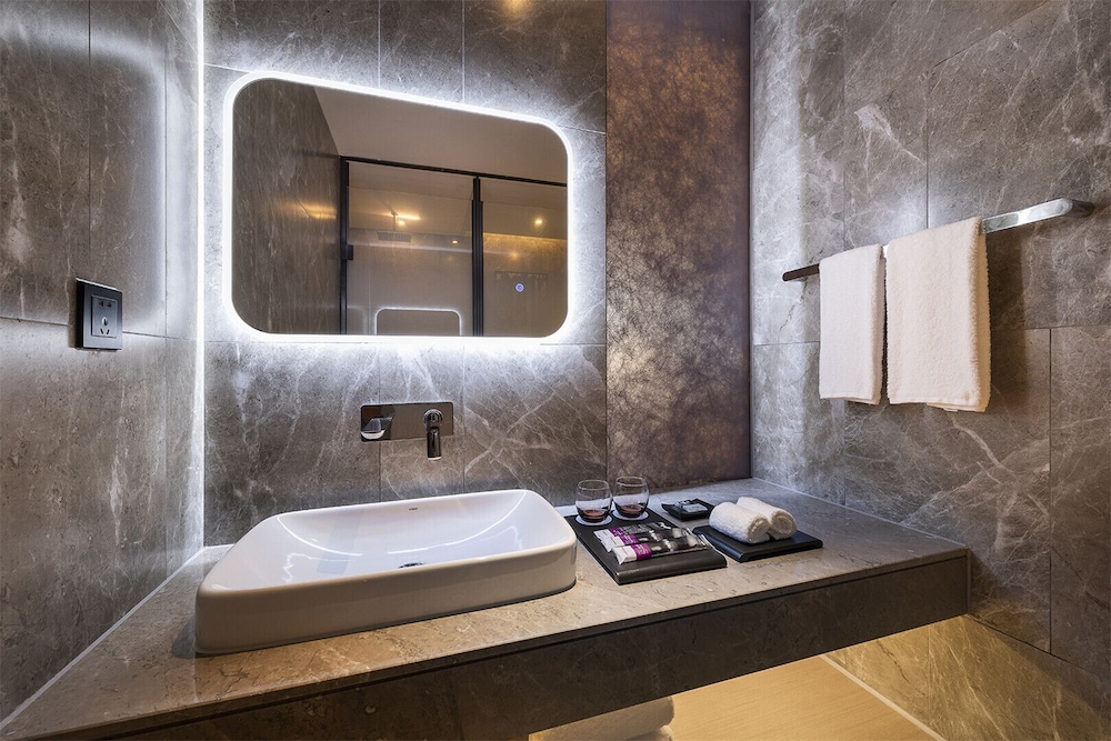 Habitación Deluxe, 1 cama de matrimonio grande del hotel Mercure Suzhou Downtown. Foto 3