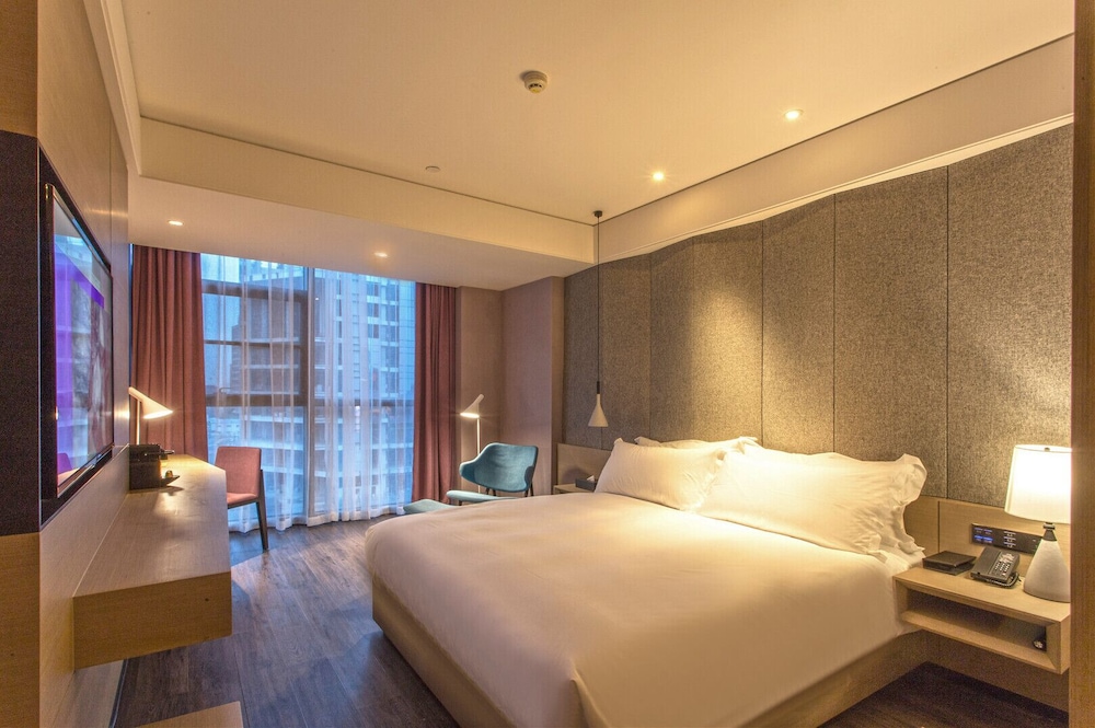 Habitación Deluxe, 2 camas individuales del hotel Mercure Suzhou Downtown. Foto 1