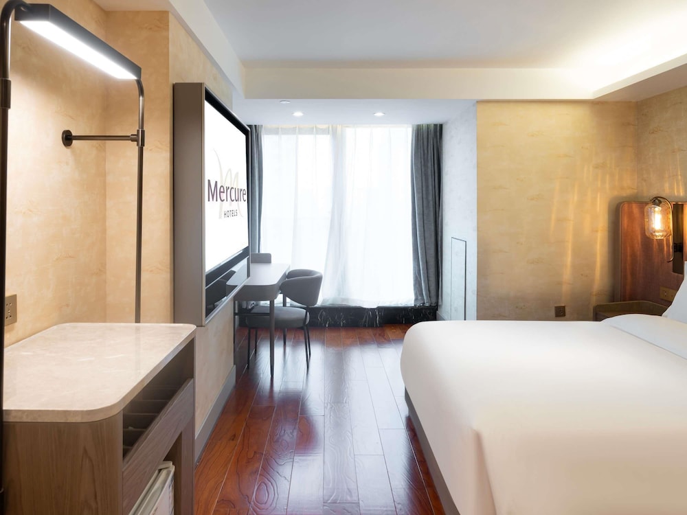 Habitación estándar, 1 cama de matrimonio grande del hotel Mercure Chongqing Downtown. Foto 3