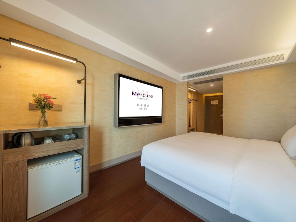 Habitación estándar, 1 cama de matrimonio grande del hotel Mercure Chongqing Downtown. Foto 7