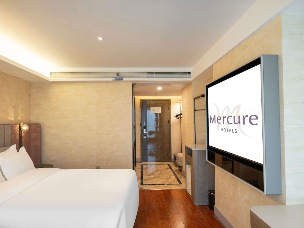 Habitación Deluxe, 2 camas de matrimonio del hotel Mercure Chongqing Downtown. Foto 2