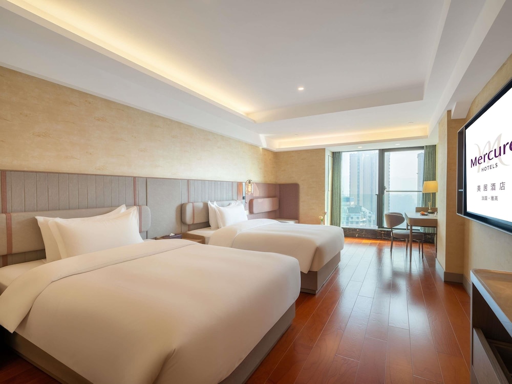 Habitación Deluxe, 2 camas de matrimonio del hotel Mercure Chongqing Downtown. Foto 8