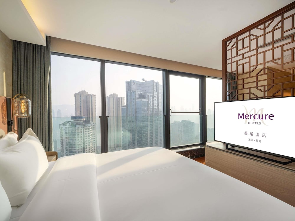 Habitación Deluxe, 1 cama de matrimonio grande, vistas a la ciudad del hotel Mercure Chongqing Downtown. Foto 2