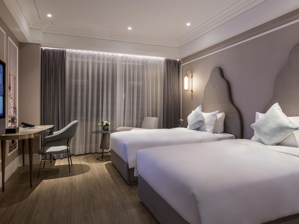 Habitación estándar con 2 camas individuales del hotel Mercure Shanghai Global Harbour