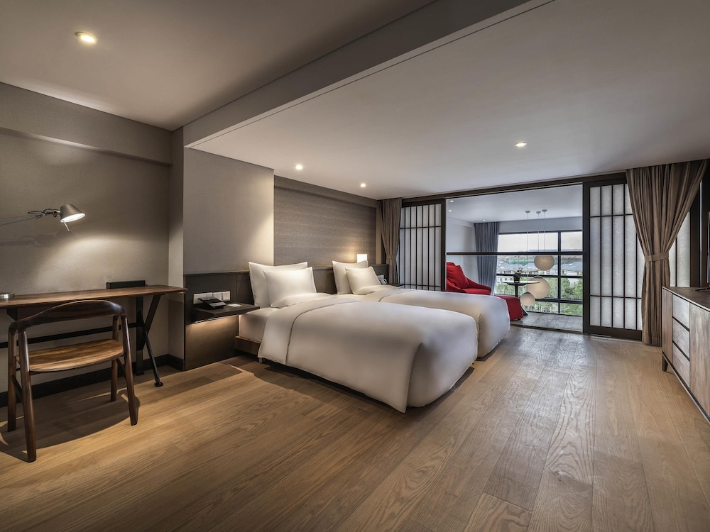 Suite Deluxe con 2 camas individuales del hotel Novotel Suites Shanghai Hongqiao. Foto 1