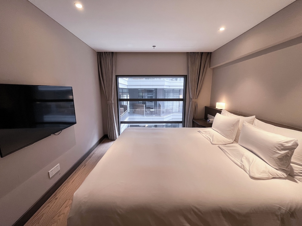 Suite Ejecutiva con 2 camas king size, Dúplex del hotel Novotel Suites Shanghai Hongqiao. Foto 1