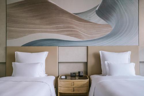 Deluxe Executive Twin Room with City View - Lounge Access del hotel Pullman Shanghai Qingpu Excellence. Foto 12