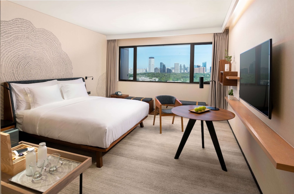 1 Cama King del hotel BEI Zhaolong Hotel, JdV by Hyatt. Foto 1
