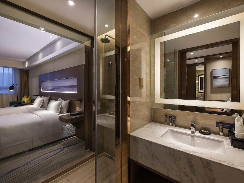 Habitación, 2 camas individuales (Privilege) del hotel Novotel Qingdao New Hope. Foto 1