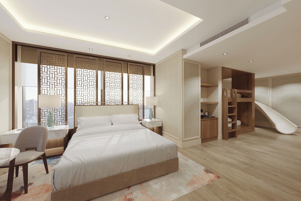 Habitación Familiar con 1 Cama King y Literas del hotel The Ambassador Seoul - A Pullman. Foto 1