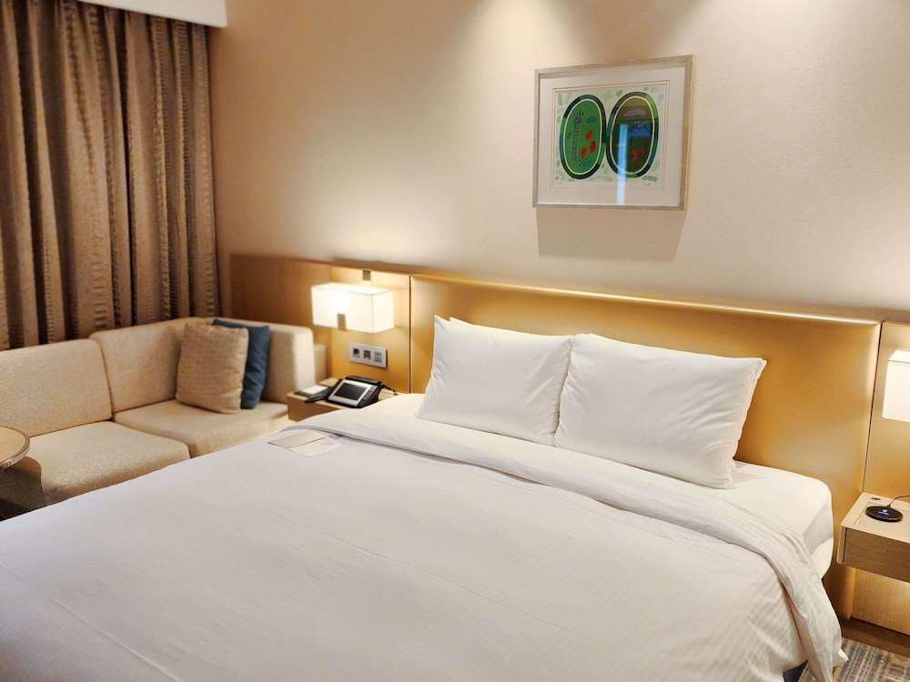Habitación Deluxe con 1 cama queen del hotel Novotel Ambassador Seoul Gangnam