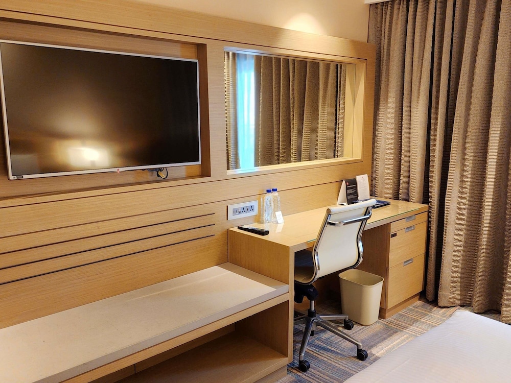 Habitación Deluxe con 1 cama queen del hotel Novotel Ambassador Seoul Gangnam. Foto 5