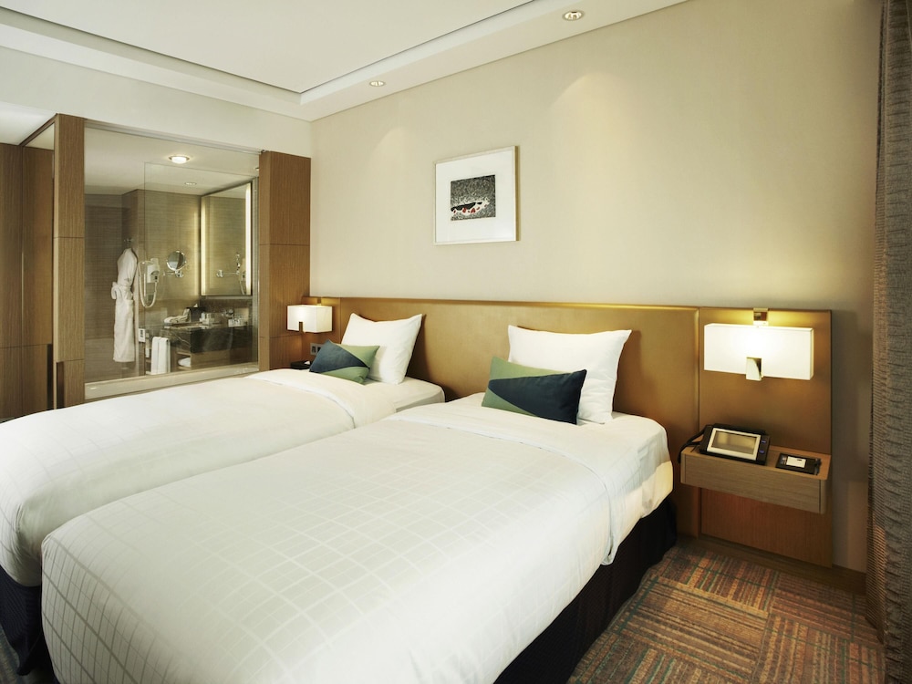 Habitación Deluxe con 2 camas individuales del hotel Novotel Ambassador Seoul Gangnam