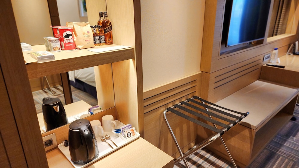 Habitación Deluxe con 2 camas individuales del hotel Novotel Ambassador Seoul Gangnam. Foto 2