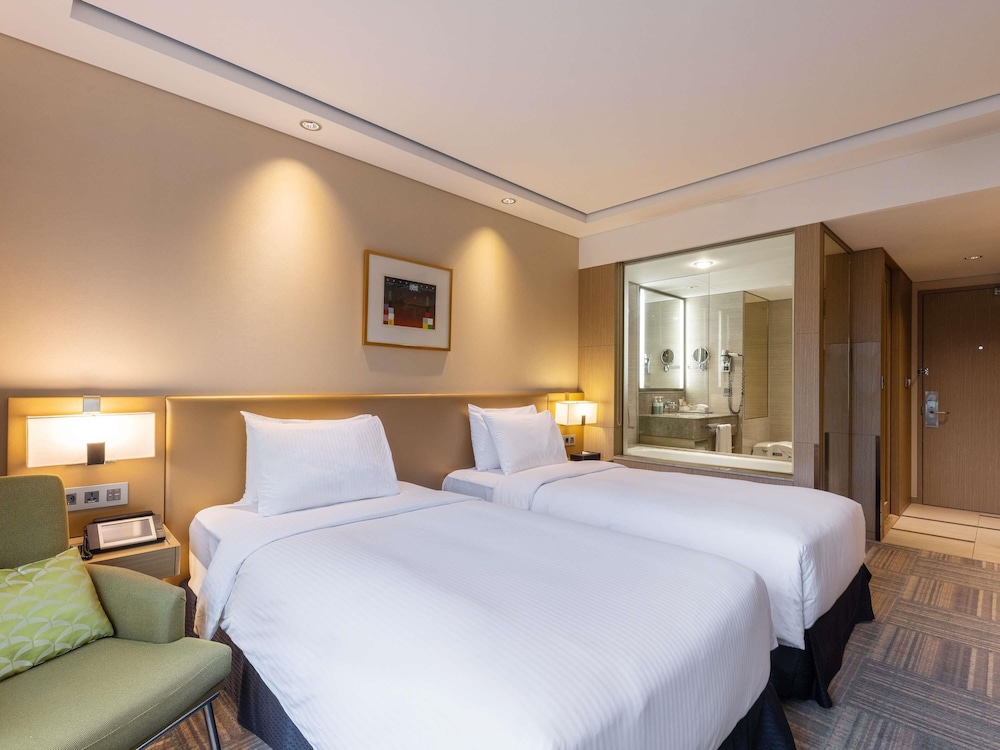 Habitación Deluxe con 2 camas individuales del hotel Novotel Ambassador Seoul Gangnam. Foto 3