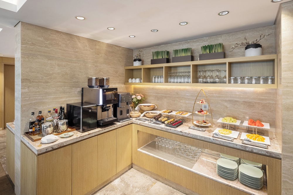 Habitación Ejecutiva con 1 cama queen del hotel Novotel Ambassador Seoul Gangnam. Foto 7