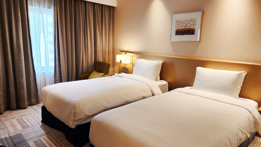 Habitación ejecutiva con 2 camas individuales del hotel Novotel Ambassador Seoul Gangnam. Foto 3