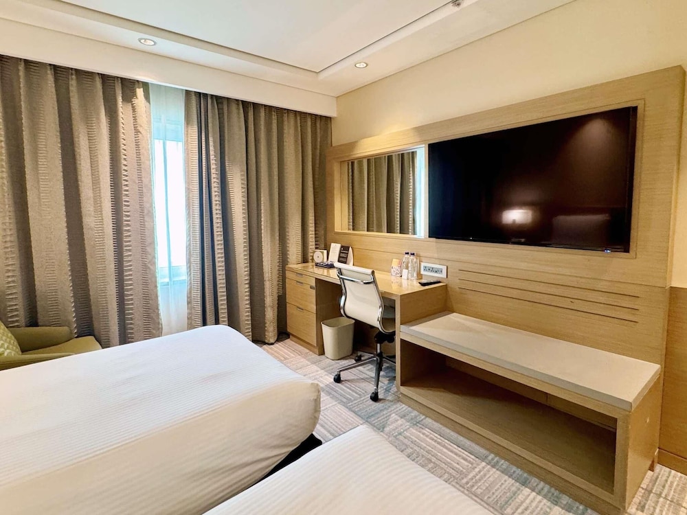 Habitación ejecutiva con 2 camas individuales del hotel Novotel Ambassador Seoul Gangnam. Foto 7