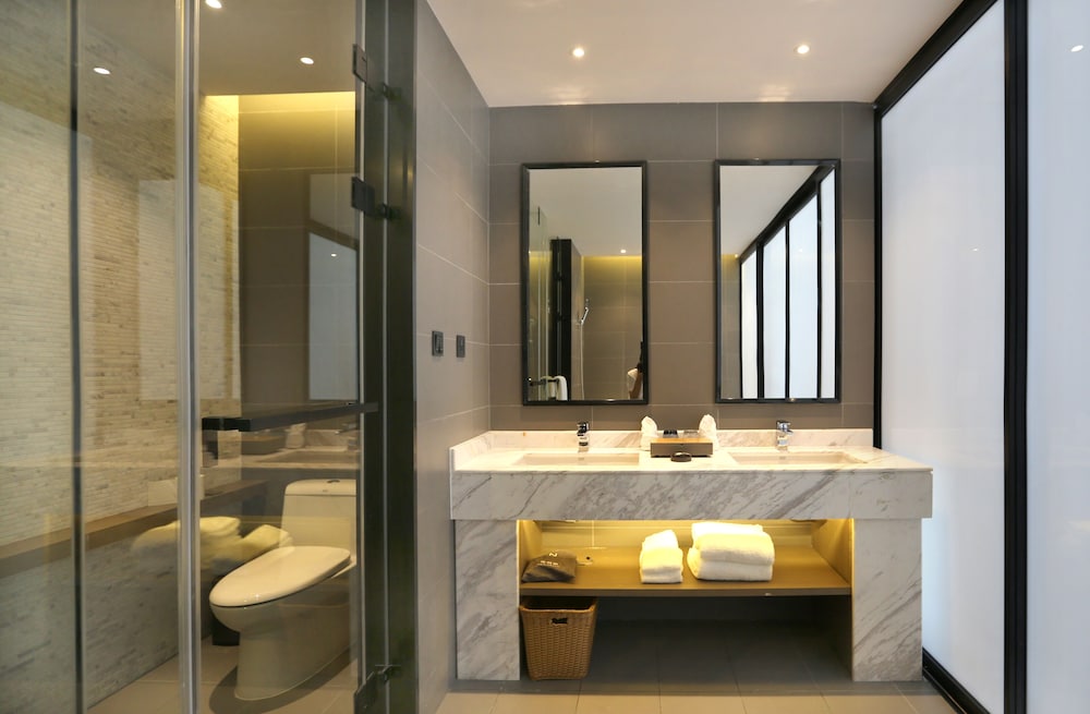 Habitación ejecutiva con 2 camas individuales del hotel Novotel Deqing Moganshan. Foto 5