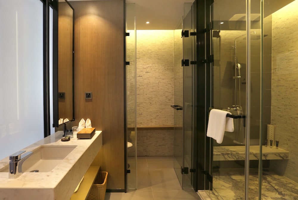 Habitación estándar con 2 camas individuales del hotel Novotel Deqing Moganshan. Foto 5