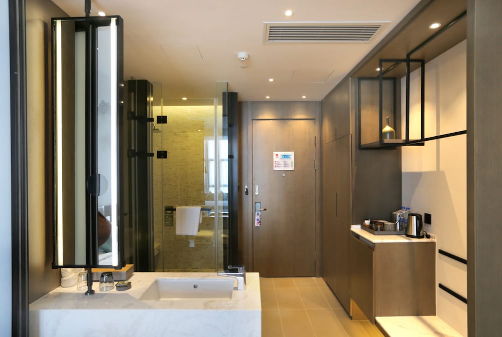 Habitación Deluxe con 2 camas individuales del hotel Novotel Deqing Moganshan. Foto 3