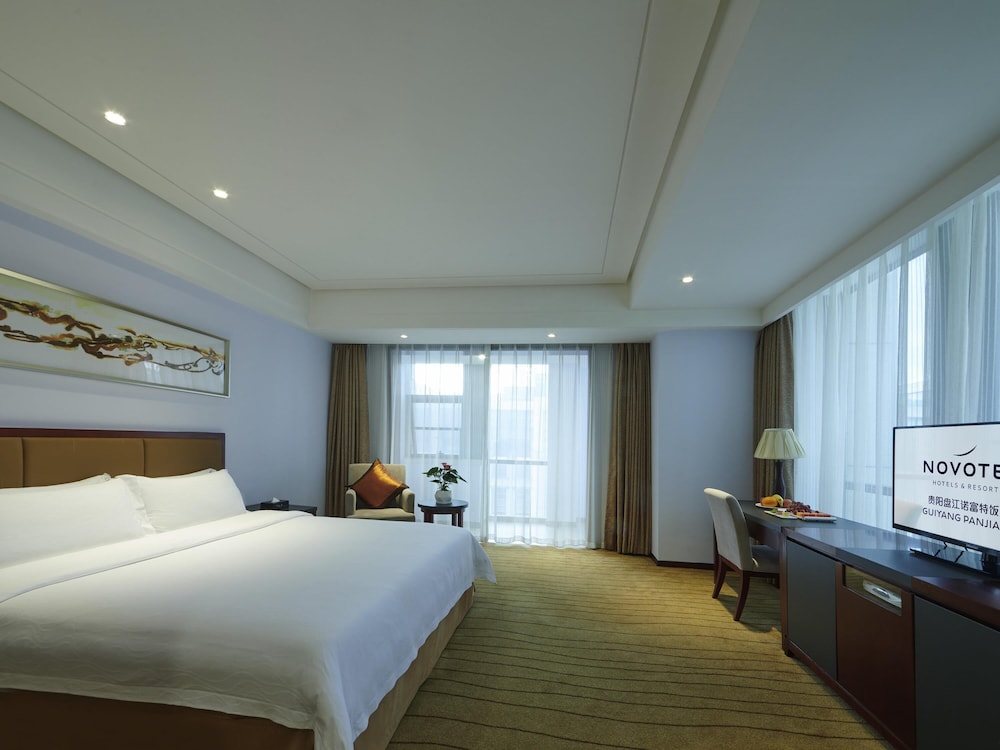 Habitación estándar con 1 cama king size, vistas al jardín del hotel Novotel Guiyang Panjiang