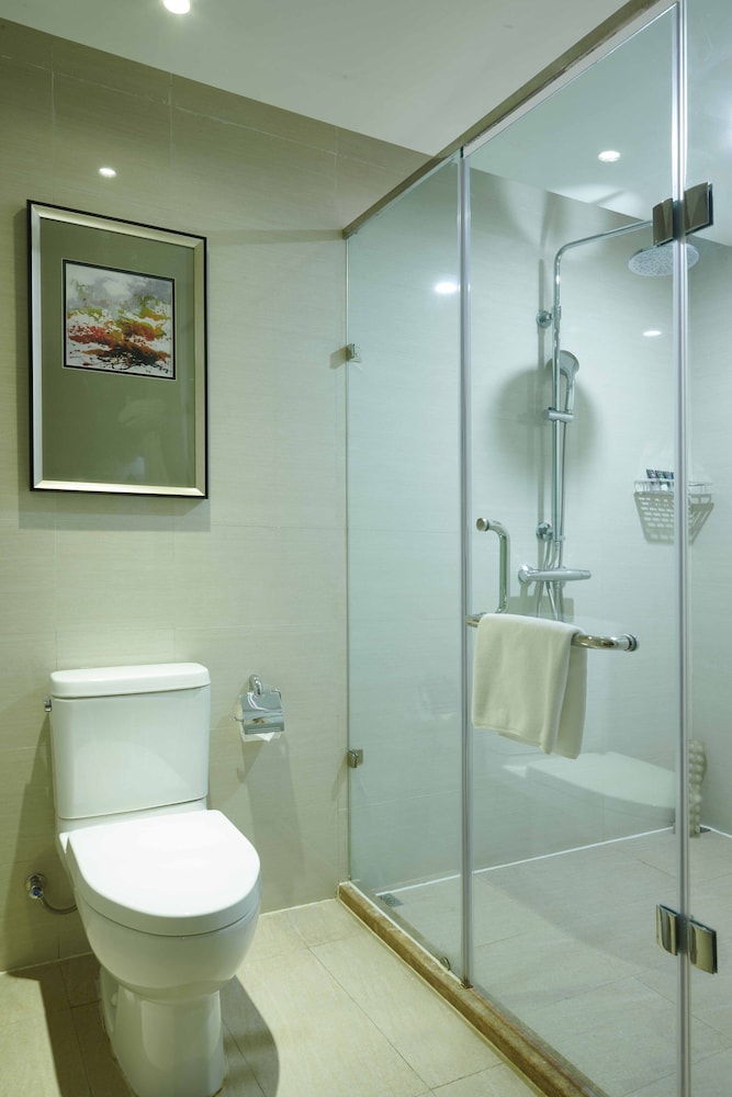 Habitación Estándar con 2 camas individuales, Vistas al Jardín del hotel Novotel Guiyang Panjiang. Foto 1