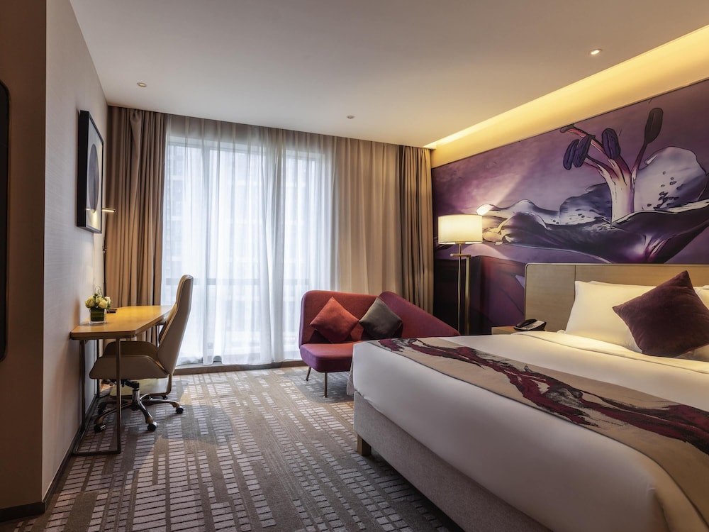HABITACIÓN SUPERIOR con 1 cama king size del hotel Novotel Zhengzhou Airport. Foto 4