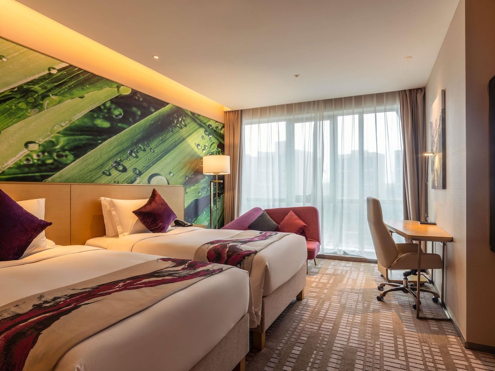Habitación Premier con camas gemelas, acceso al salón del hotel Novotel Zhengzhou Airport