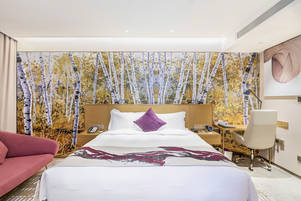 Suite Junior con una Cama King Size del hotel Novotel Zhengzhou Airport. Foto 6