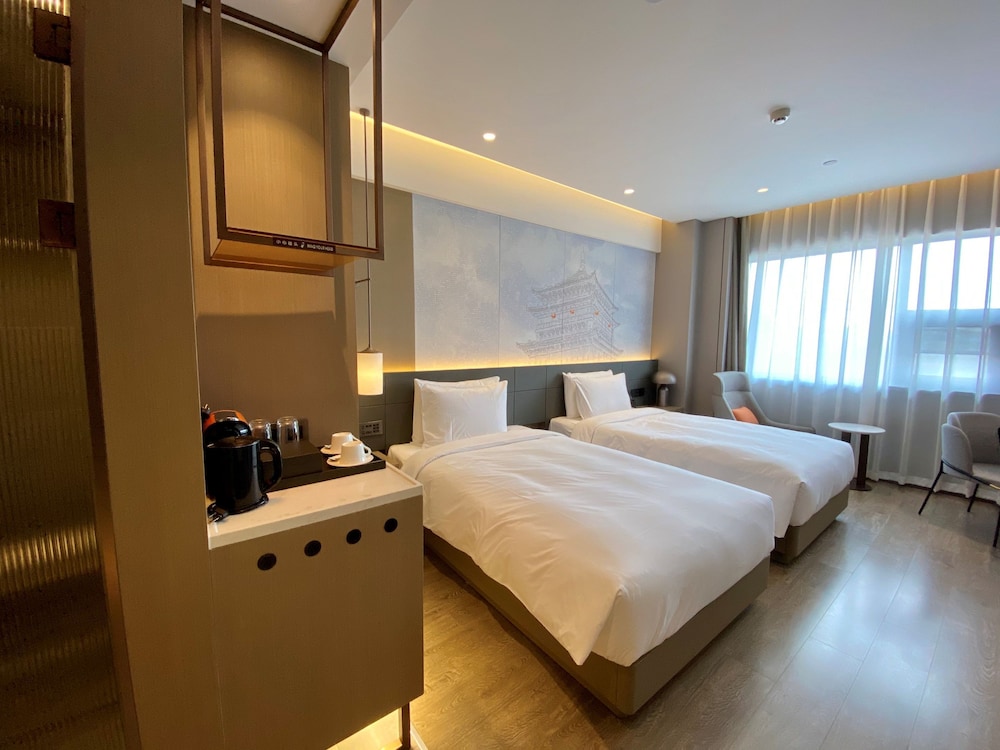 Habitación superior, 2 camas individuales del hotel Novotel Xi'an The Bell Tower. Foto 1