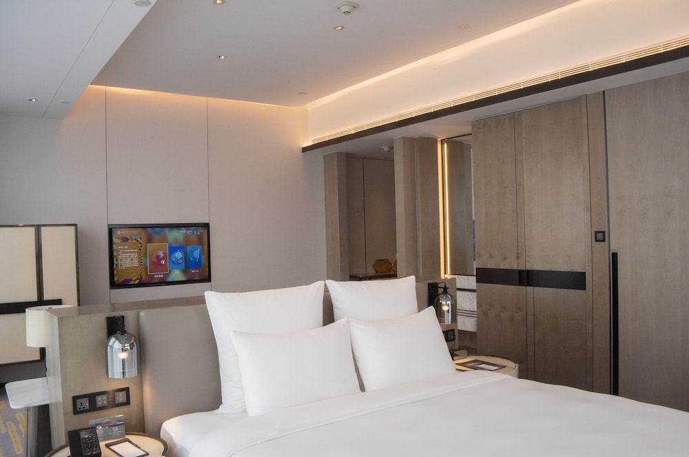 Habitación superior, 1 cama de matrimonio grande del hotel Pullman Suzhou Zhonghui. Foto 3