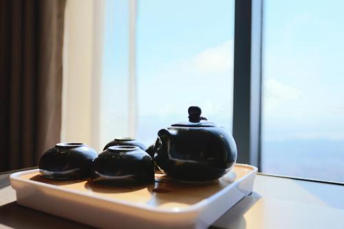 Deluxe King Executive Room with View del hotel Pullman Huizhou Kaisa. Foto 1