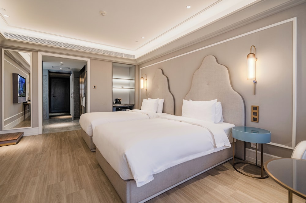 Habitación superior con 2 camas individuales, 2 camas individuales del hotel Mercure Hohhot Downtown. Foto 1