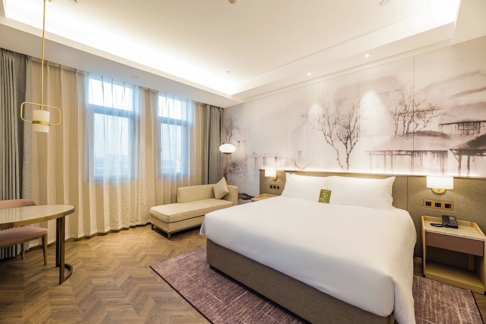 Habitación estándar, 1 cama de matrimonio grande del hotel Mercure Changzhou Jintan. Foto 1
