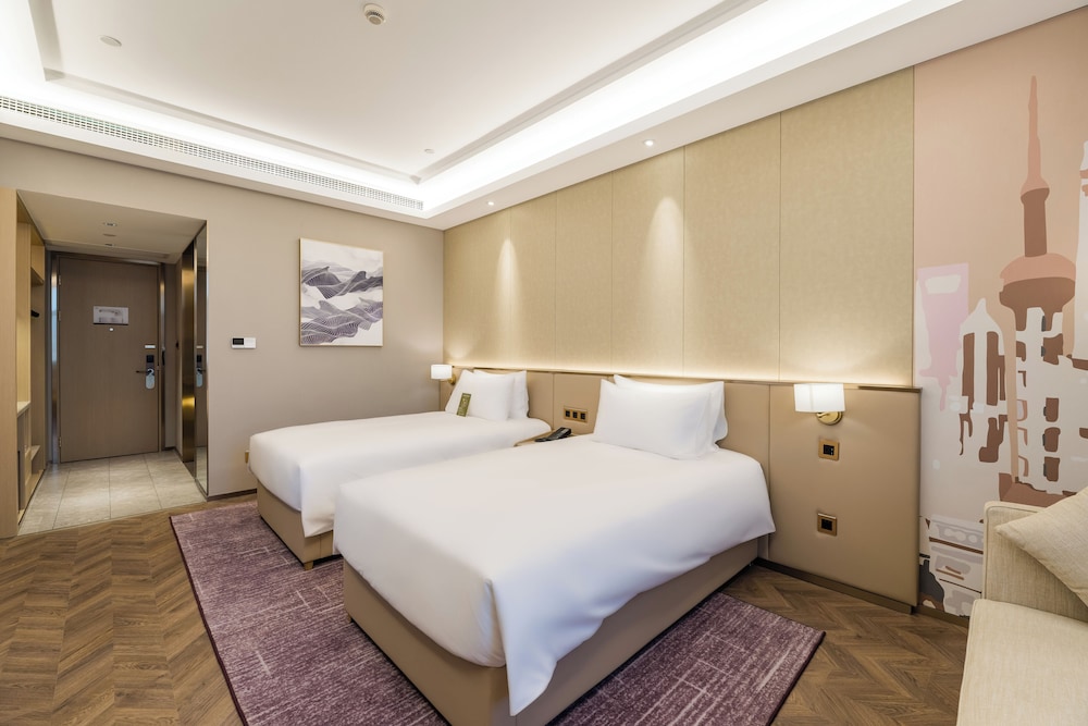 Habitación estándar con 2 camas individuales, 2 camas individuales del hotel Mercure Changzhou Jintan. Foto 2