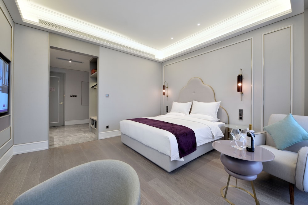 Habitación superior, 1 cama de matrimonio grande del hotel Mercure Taiyuan Jinyang. Foto 2