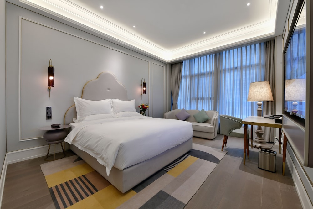 Habitación superior, 1 cama de matrimonio grande del hotel Mercure Taiyuan Jinyang. Foto 3