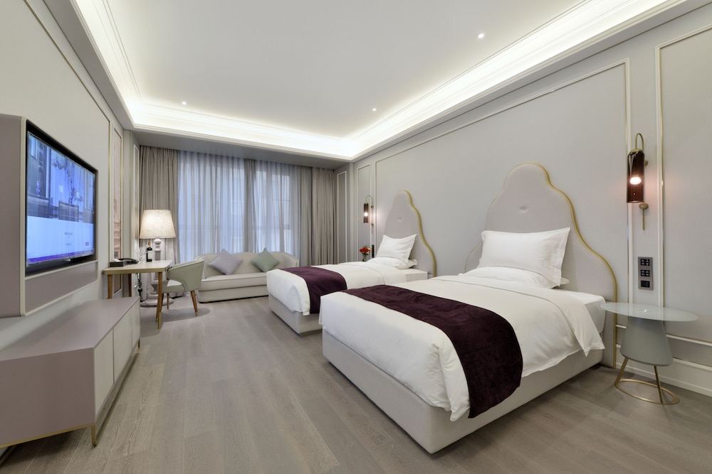 Habitación Familiar del hotel Mercure Taiyuan Jinyang. Foto 1
