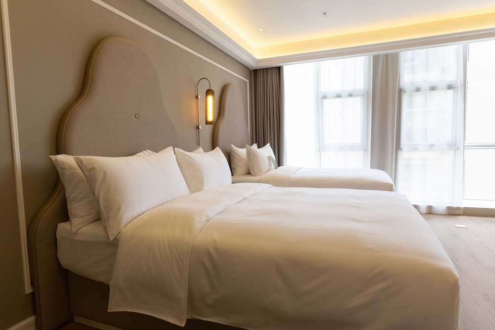 Habitación familiar, 2 camas dobles (Classic) del hotel Mercure Taiyuan E Tech. Foto 1