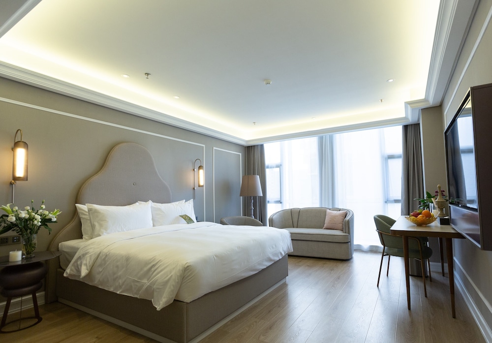Habitación Deluxe, 1 cama de matrimonio grande del hotel Mercure Taiyuan E Tech. Foto 1