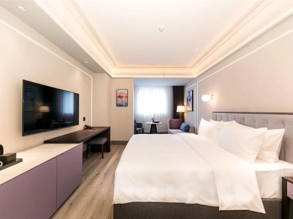 Habitación Estándar con 1 cama king - size del hotel Mercure Xian Qujiang. Foto 5