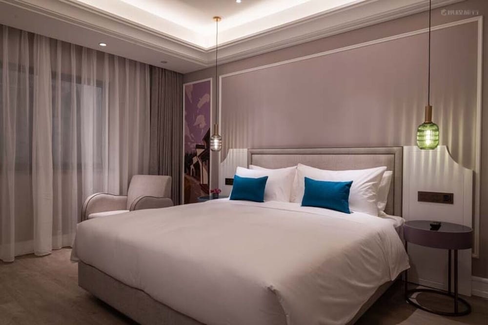 Habitación Clásica KGD con 1 cama king size del hotel Mercure Hangzhou Xixi Future Tech City. Foto 1