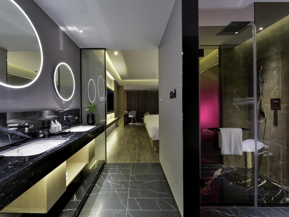 Habitación Familiar Clásica del hotel Mercure Taiyuan Changfeng Street. Foto 1