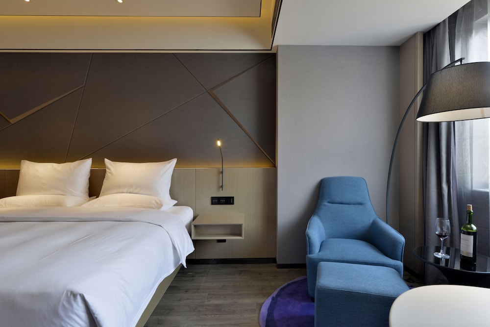 HABITACIÓN SUPERIOR con 1 cama king size del hotel Mercure Taiyuan Changfeng Street. Foto 1