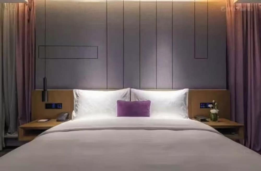 Habitación Superior con 1 cama king - size del hotel Mercure Kunshan Mixc Hi-tech. Foto 1