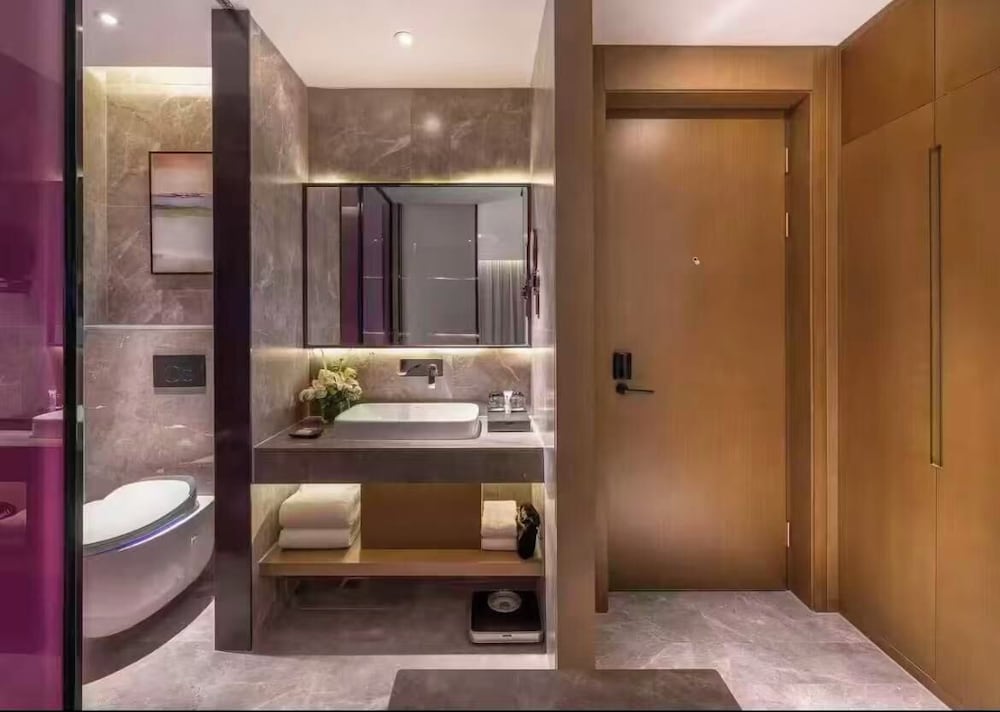 Habitación Ejecutiva con 1 cama king - size del hotel Mercure Kunshan Mixc Hi-tech. Foto 1