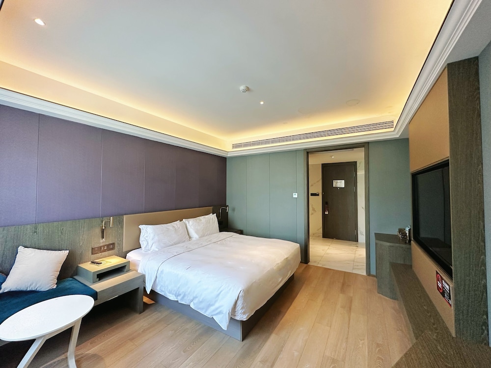 Habitación Deluxe con 1 cama king size del hotel Mercure Shanghai Necc. Foto 2